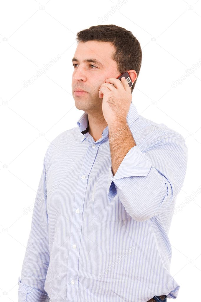 Young casual man on the phone, isolated on white
