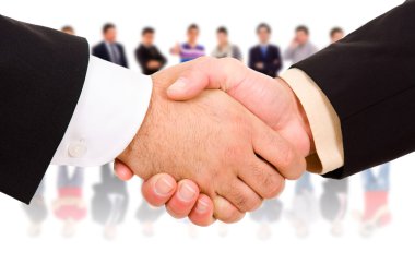 Closeup picture of businesspeople shaking hands, making an agreement. clipart