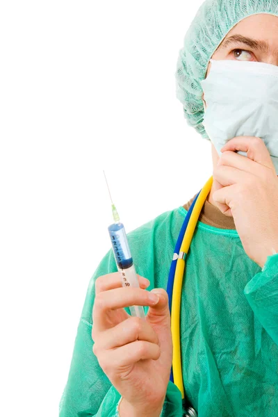 Junger Chirurg mit Spritze, isoliert auf weiß — Stockfoto