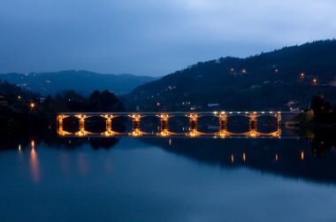 Bridge of Geres national park at night, north of Portugal clipart