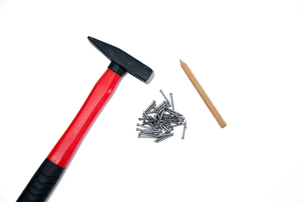 Hammer and nails on white isolated background — Stock Photo, Image