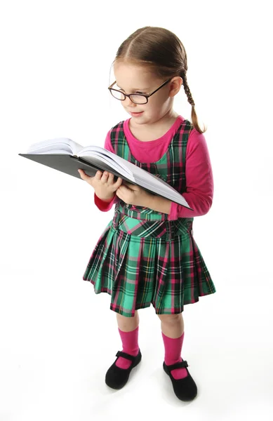 Preschool girl with book — Stock Photo, Image