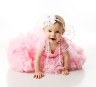 Baby girl wearing pettiskirt tutu and pearls clipart