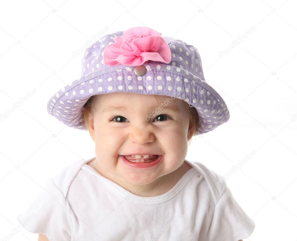 Smiling baby with hat