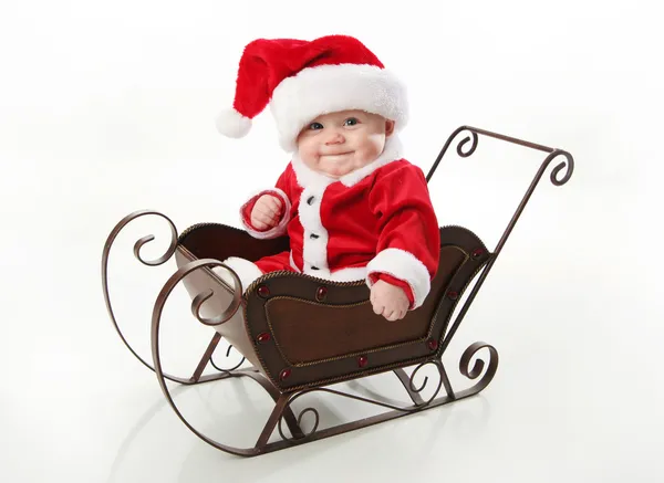 圣诞老人宝宝坐在雪橇 — 图库照片