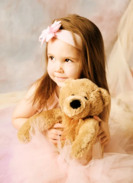 Adorable Little Girl Dressed Ballerina Tutu Bow Headband Hugging Teddy — Zdjęcie stockowe