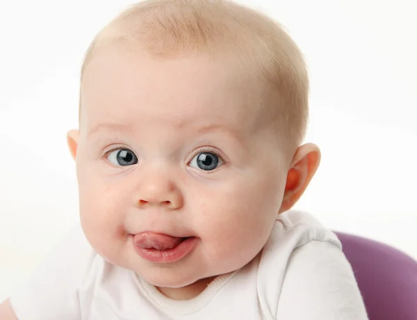 Bebê colando a língua — Fotografia de Stock