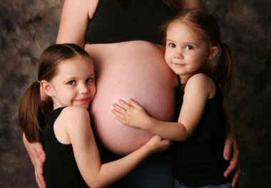 Mom's pregnant belly and sisters clipart