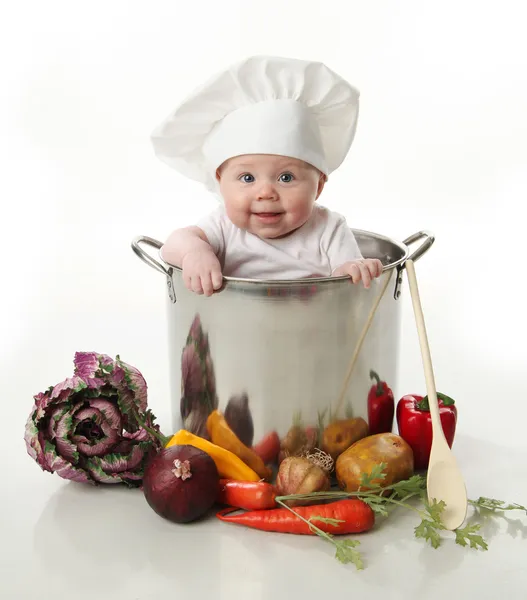 Portrait Smiling Baby Sitting Large Cooking Stock Pot Surrounded Vegetables — Stock Photo, Image