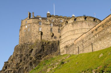 Edinburgh Castle and battlements on a warm summer day. clipart