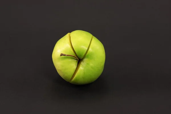 Зеленое яблоко как диаграмма — стоковое фото