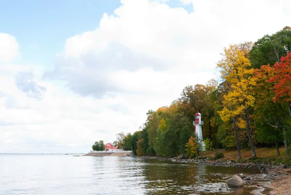 stock image Lighthouse on bank of bay