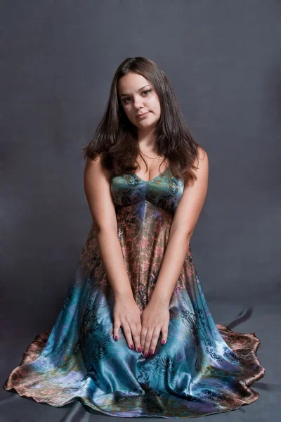 Girl in versicolor dress — Stock Photo, Image