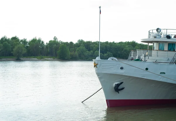 stock image Anchored shipon the river on forest background