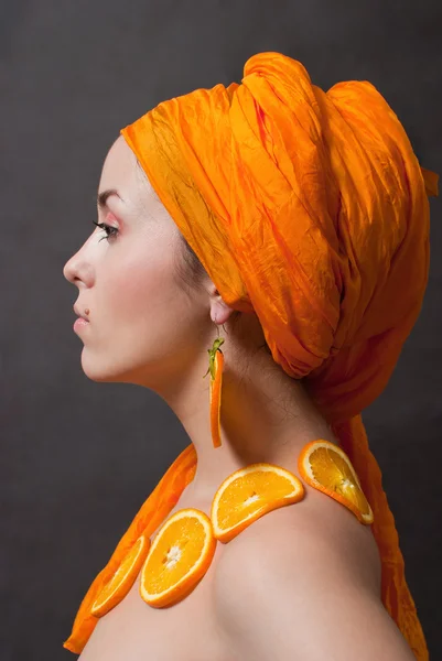Girl with orange headscarf — Stock Photo, Image