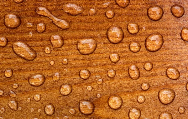 Wassertropfen auf Holz — Stockfoto