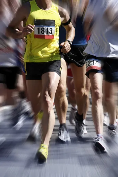 Corredores de maratón - movimiento borroso — Foto de Stock