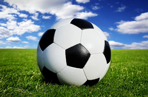 Soccer ball on grass — Stock Photo, Image