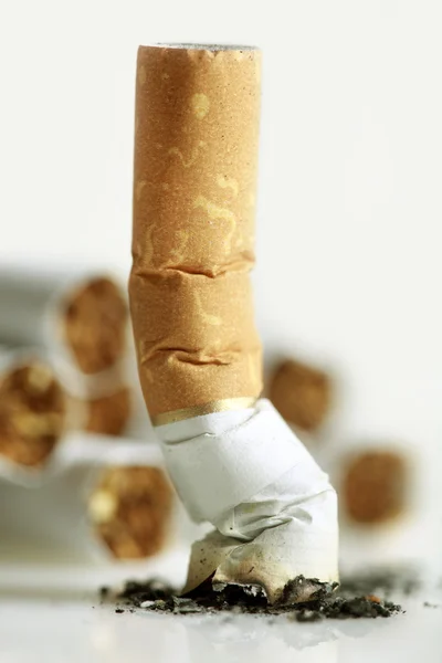 Close up of cigarette on white — Stock Photo, Image