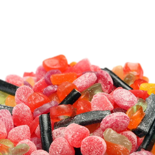 Fotó alatt fehér háttér színes cukorkák — Stock Fotó