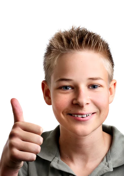 Ung pojke med sina tummar upp med glädje — Stockfoto