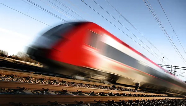 Comboio rápido com borrão de movimento — Fotografia de Stock