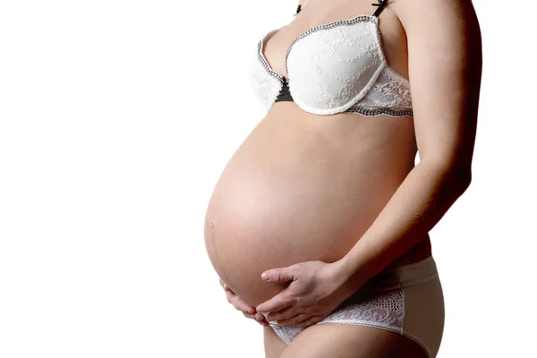 Těhotné břicho, izolované proti Bílému pozadí — Stock fotografie
