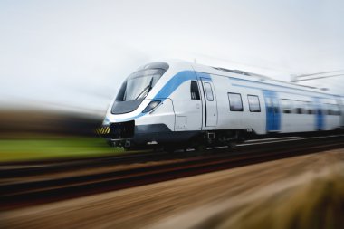 Fast train with motion blur clipart