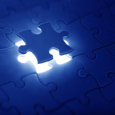 Jigsaw puzzle with the missing piece clipart