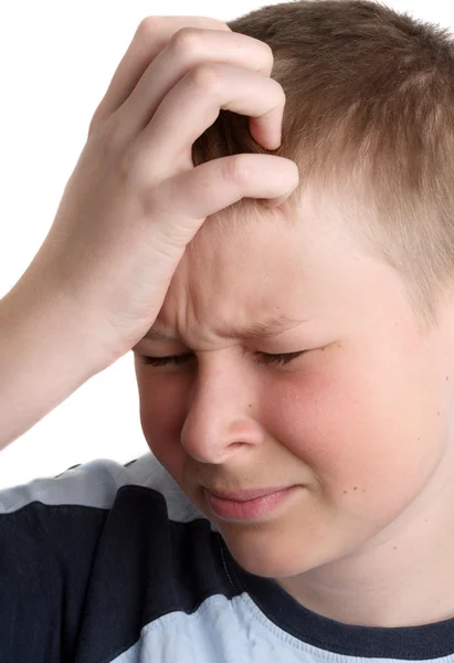 Junge mit Kopfschmerzen — Stockfoto