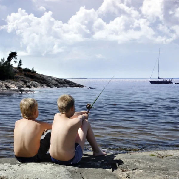 Two boys fishing — Stock Photo, Image