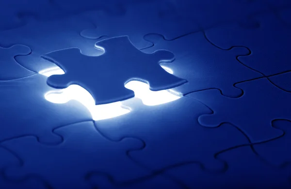 Jigsaw puzzle with the missing piece — Stock Photo, Image