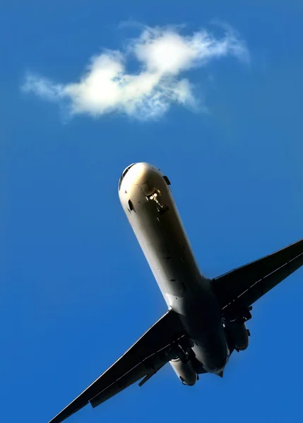 Flugzeug über den Wolken — Stockfoto