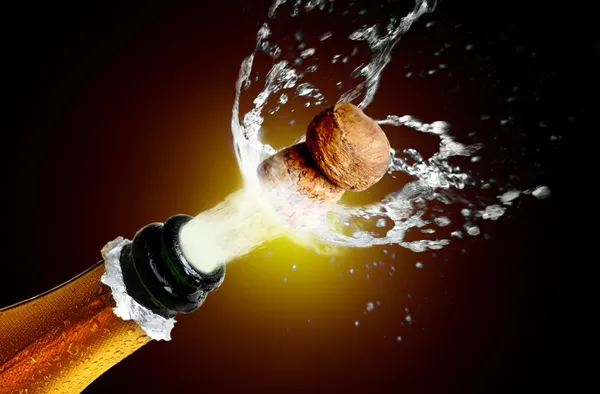 Close-up van champagne cork popping — Stockfoto