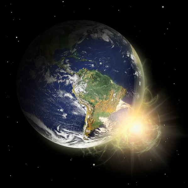 Prawdziwe ziemi planeta w żółte słońce. słoneczna miejscu wyeksponowany. — Zdjęcie stockowe