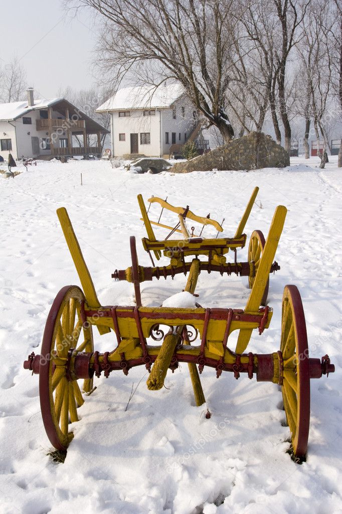 Old cart in the snow