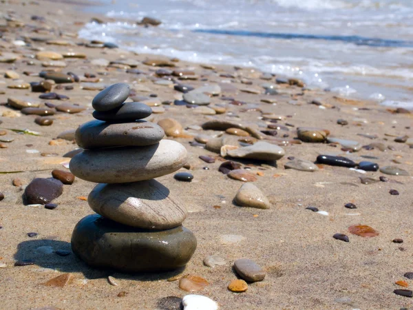 Stock image Tower from stones on seacoast