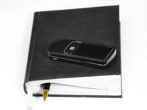 Notebook and pen Stock Picture
