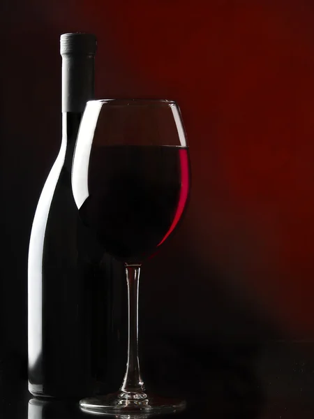 Red wine on the black — Stock Photo, Image
