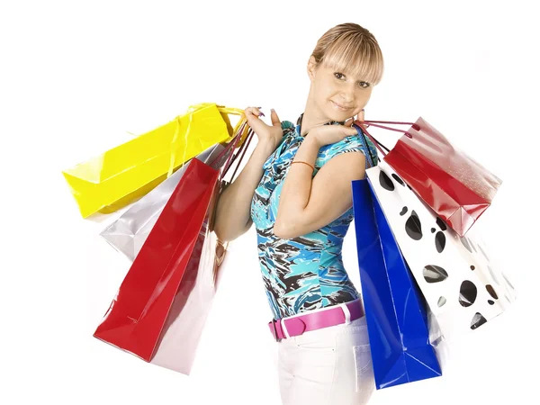 Hermosa, joven, mujer con bolsas de compras de colores en la mano — Foto de Stock
