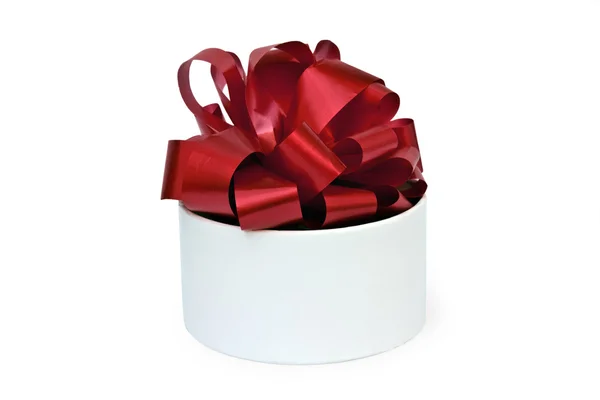 Present round box with a red bow — Stock Photo, Image