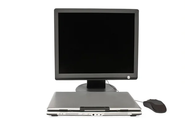 Monitor plano fechar laptop e mouse — Fotografia de Stock