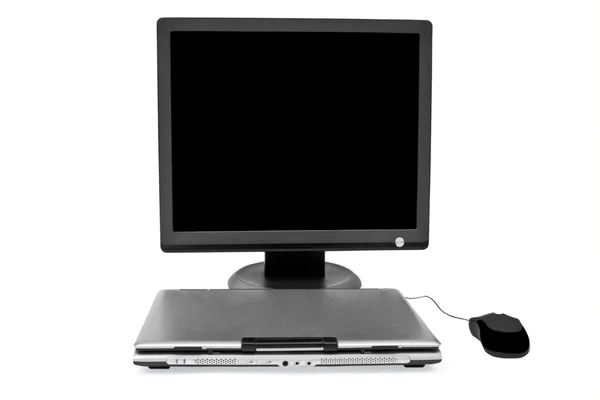 Monitor plano fechar laptop e mouse — Fotografia de Stock