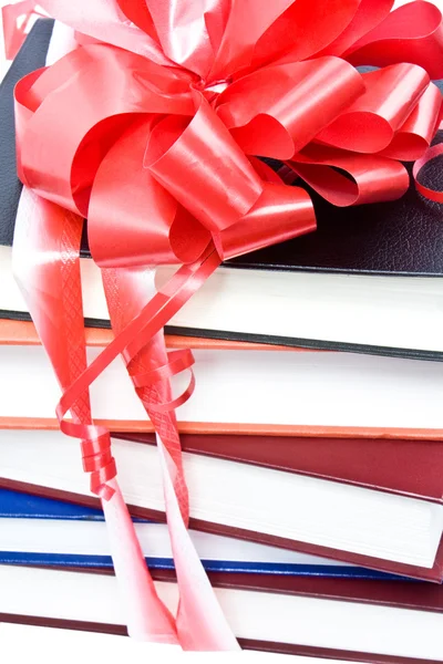 Books with a ribbon and a bow — Stock Photo, Image
