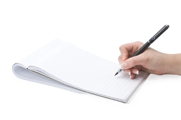 Escrevendo em uma mão notebook Imagem De Stock