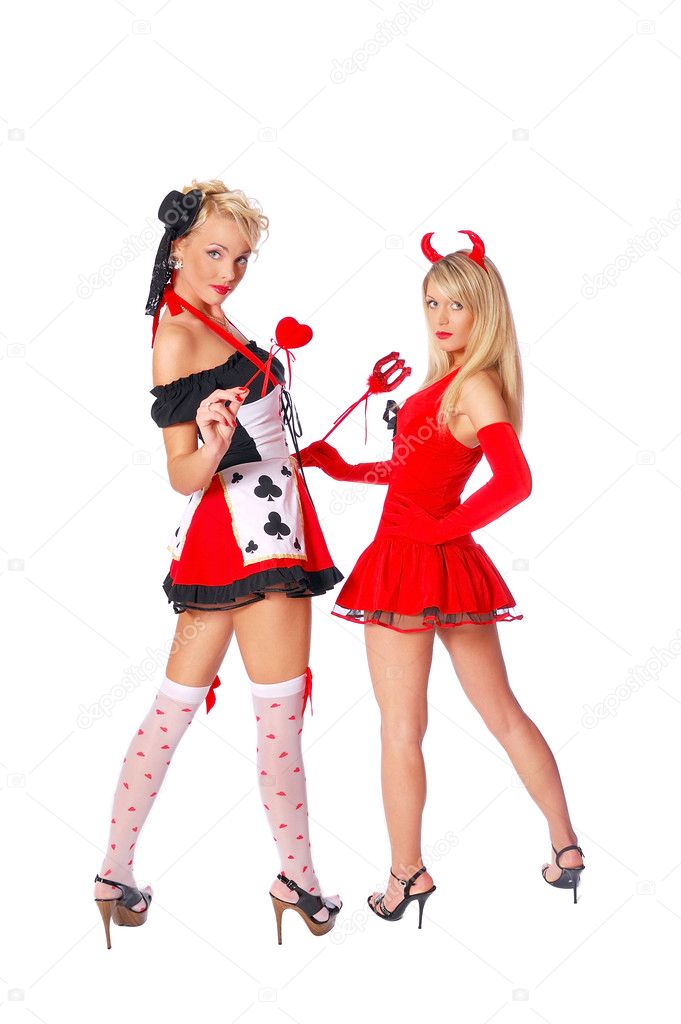 Two sexy girls in a party costumes. Devil and queen of hearts