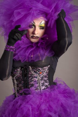Drag queen in violet dress clipart