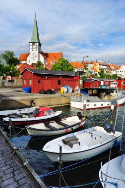 Marina and white church in Ronne, Bornholm, Denmark clipart