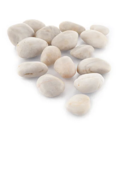 Bílé mramorové kameny na bílém pozadí — Stock fotografie