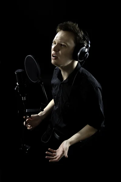 stock image Young man singing